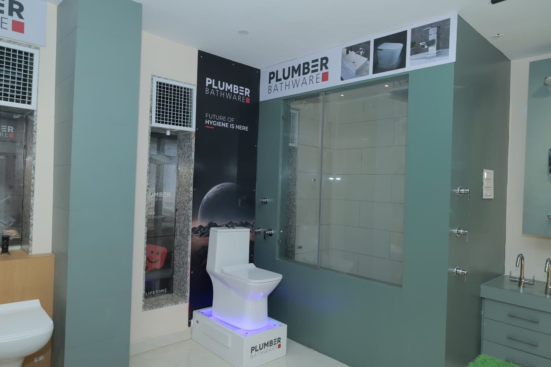 Plumber Bathware corner with smart WC and shower cubicle